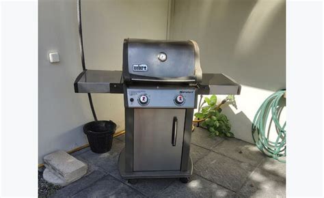 Weber 2-burner gas grill - Furniture and outdoor equipment Saint Martin ...