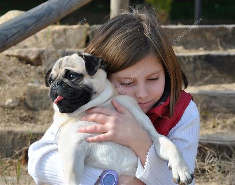 Children with her pug dog — Stock Photo © expressiovisual #21615399