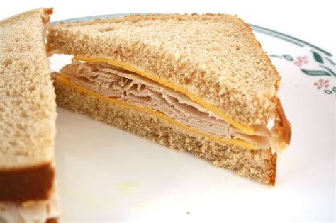 Turkey And Cheese Sandwich With Lettuce And Ketchup To Dip Wheat Bread Whole Grain Bread