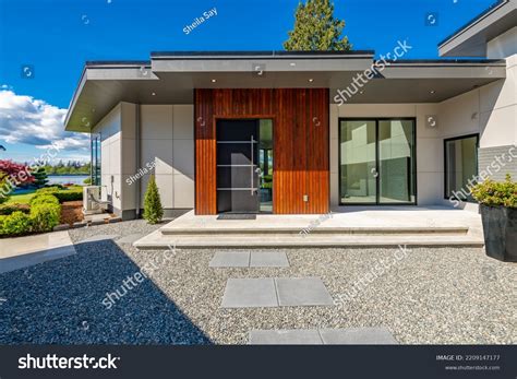 Contemporary Home Exterior On Lakeshore Flat Stock Photo 2209147177 ...