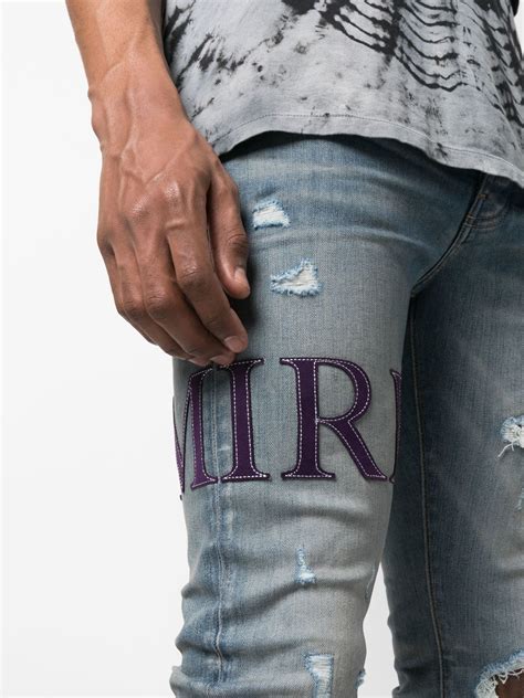 Amiri Jean Skinny à Logo Imprimé Farfetch