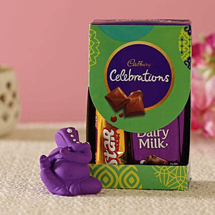 Buy Send Purple Flute Ganesha Idol Cadbury Combo Online Fnp