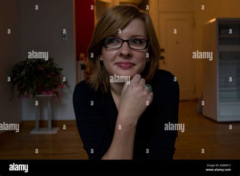 Casual Portrait Of Caucasian Woman With Black Rimmed Glasses In The