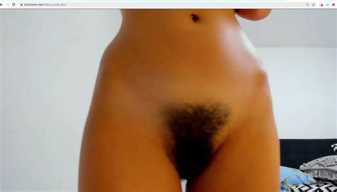 Latina Shoves Her Black Hitachi In Her Hairy Pussy