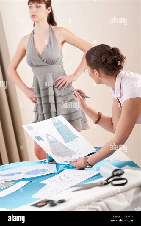 model fitting  female fashion designer stock photo alamy