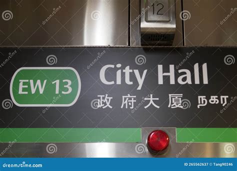 city hall mrt station sign  singapore editorial photography image