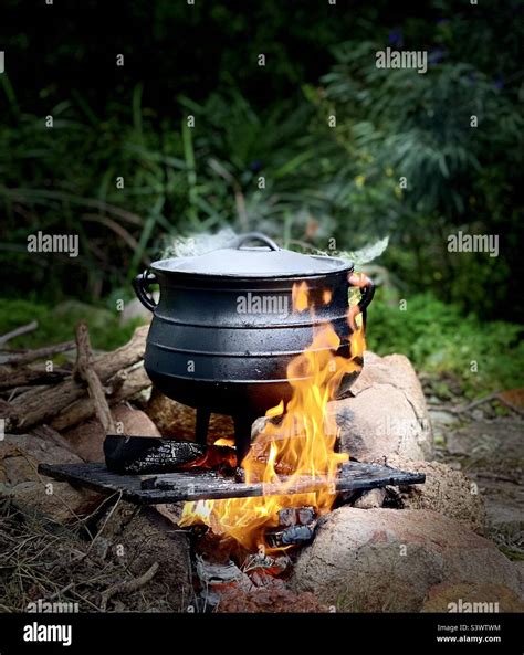 Cast Iron Pot Over An Open Fire Stock Photo Alamy