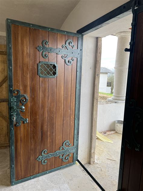 Rustic Wooden Door With Iron Work