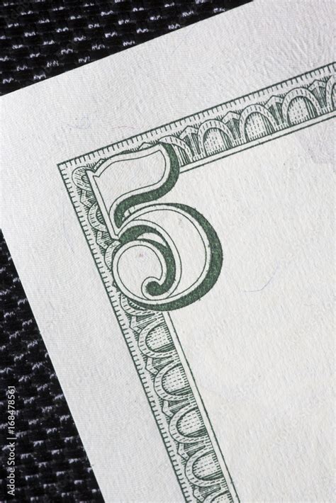 Macro shot of a US 5 dollar bill. Stock Photo | Adobe Stock