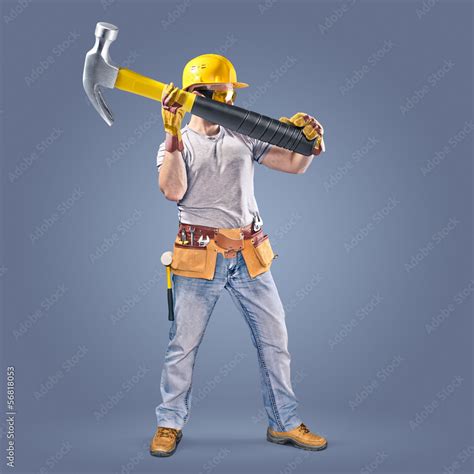 Construction Worker With A Tool Belt And A Hammer Stock Photo Adobe Stock