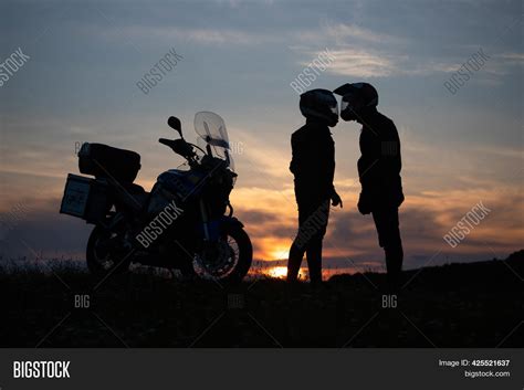 Motorcycle Couple Sunset