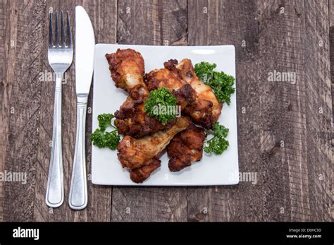 Heap Of Chicken Wings On Wooden Background Stock Photo Alamy