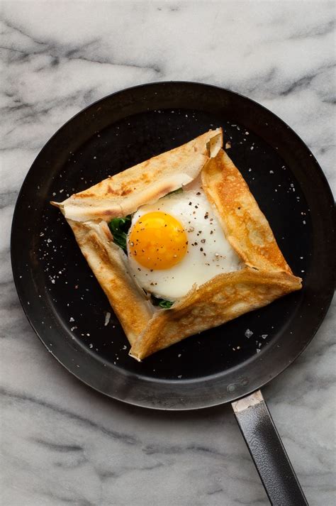 Savory Crepes With Cheese Spinach And A Fried Egg Amanda