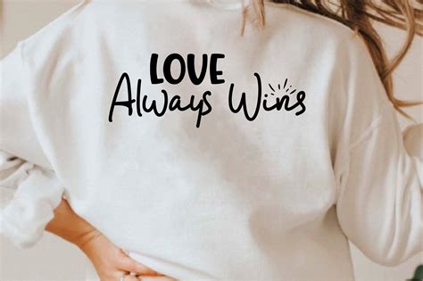 Love Always Wins Graphic by Biplab studio · Creative Fabrica