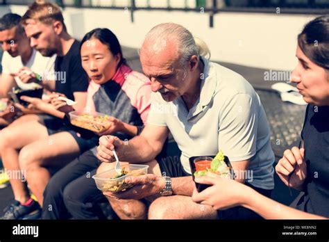 People eating healthy food Stock Photo - Alamy