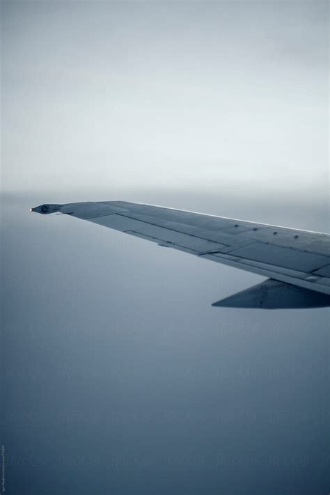 "Airplane Wing In Flight,minimal Design" by Stocksy Contributor "Igor ...