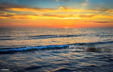 Vivid Ocean Sunset Vibrant Colors High Res Stock Photo Getty Images