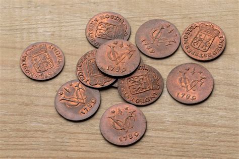 Premium Photo Heap Of Old Antique Dutch Voc Coins From 1789 On A