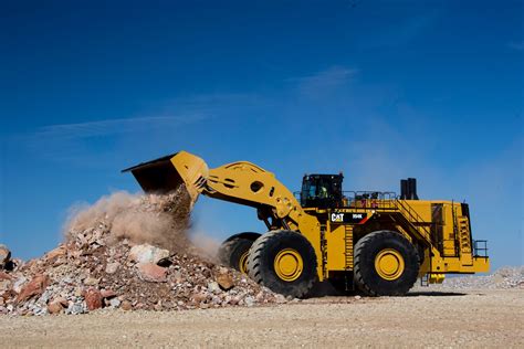 Dominance On Display Caterpillar 994 Wheel Loader Vs Dumpers Video