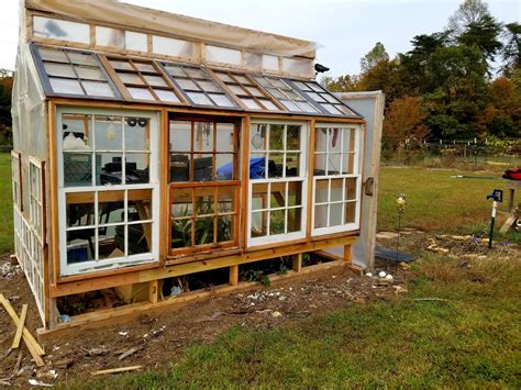 I'm replacing the plastic siding of my greenhouse with some old windows ...