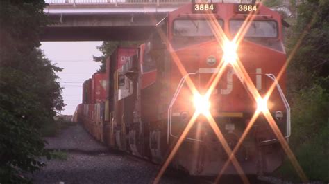 CN 100 Gevo Leads A Long Stack Train CN 120 W DPU Thru Downtown Moncton