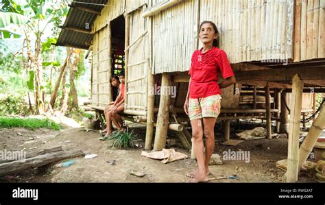 Filipino grandmother with grandchildren, in Bamboo Village house - Tibiao, Antique - Philippines ...