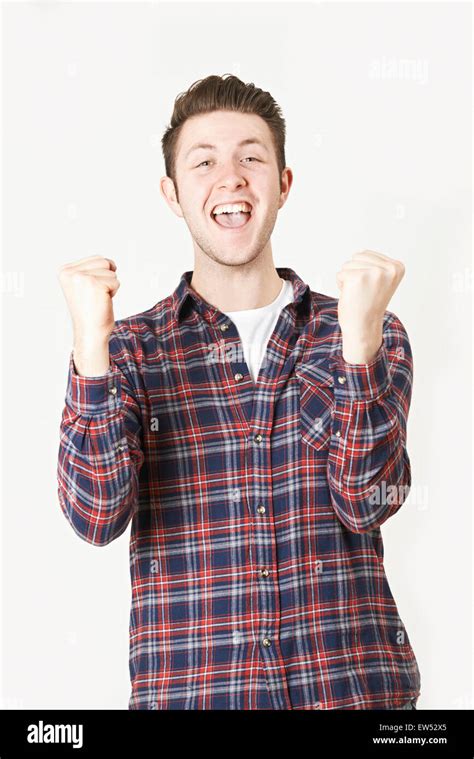 Studio Portrait Of Man With Jubilant Expression Stock Photo - Alamy