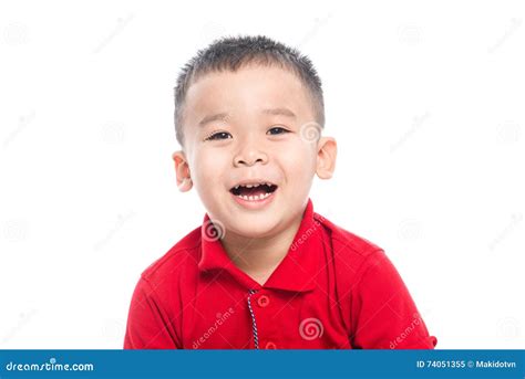 Photo Of Adorable Young Happy Asian Boy Looking At Camera Stock Image