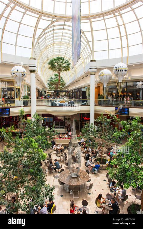 Shoppers Relax In An Atrium Inside The Chadstone Shopping Centre Stock