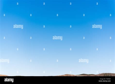 clear sky without clouds, light blue sky above the horizon without clouds for the background ...