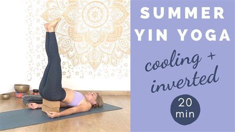 A Woman Doing Yoga Poses In Front Of A Wall With The Words Summer Yin