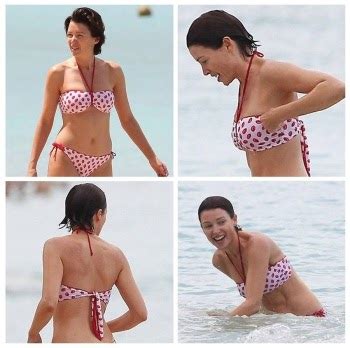 Retro Bikini Dannii Minogue Parties In A Red Bikini While Relaxing At The White Sand In Barbados