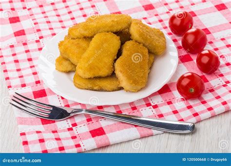 Heap Of Chicken Nuggets In Plate Tomato Cherry Fork Stock Photo