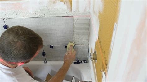 How To Tile A Shower Walland Cut Holes In Tile Home Repair Tutor