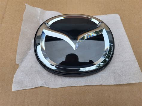 MAZDA CX30 CX 30 CX60 CX 60 EMBLEMAT LOGO ATRAPA RADAR ORYGINAŁ KBB3