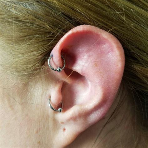 Forward Helix And Tragus Piercings With Niobium Captive Bead Rings