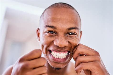 Portrait African Man And Floss Tooth For Dental Care Wellness Or