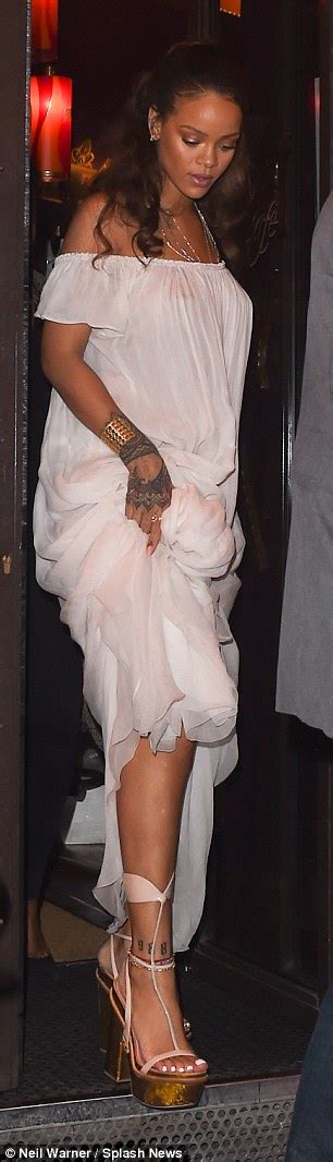 Rihanna Goes Braless In Sheer Dress At Vogue S Paris Fashion Week Party