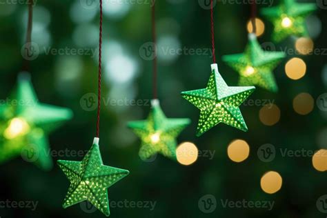 Christmas star lights on blurred green background. Led string light ...