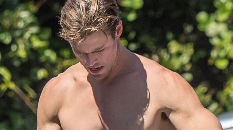 Exclusive Shirtless Chris Hemsworth Shows Off His Abs And Surfs In