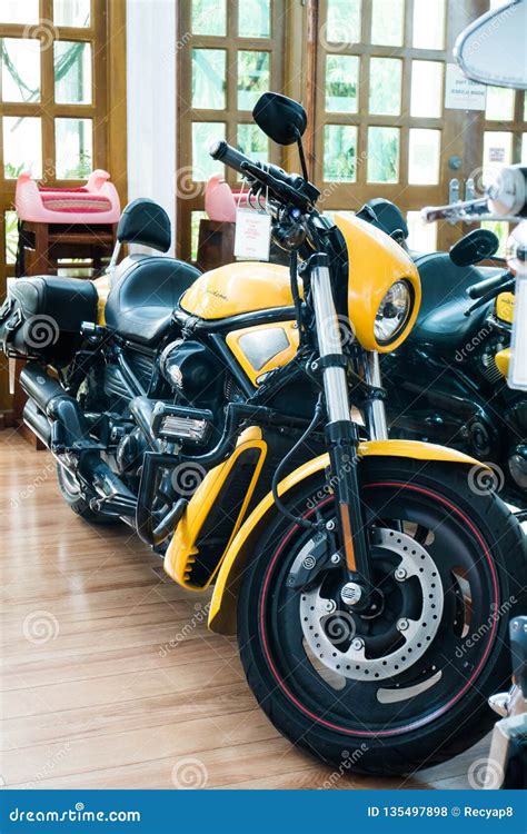 A Yellow Limited Edition Of Harley Davidson Big Bike Inside The House