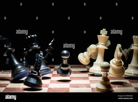 Chess Pieces Being Knocked Down Stock Photo Alamy