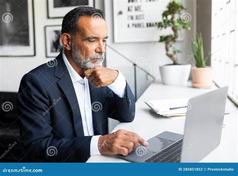 Calm Confident Serious Concentrated Caucasian Senior Businessman In