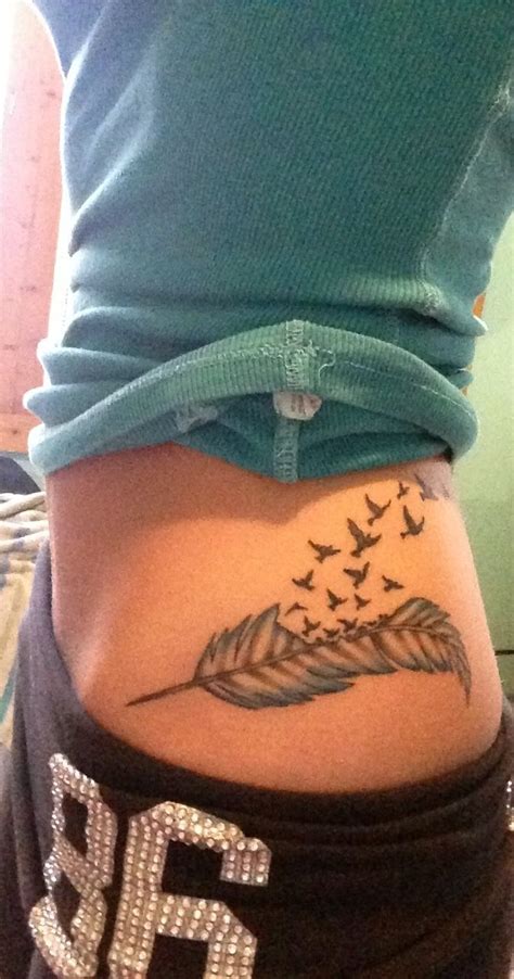 feather and bird tattoo | Feather tattoo bird tattoo blue tattoo ...