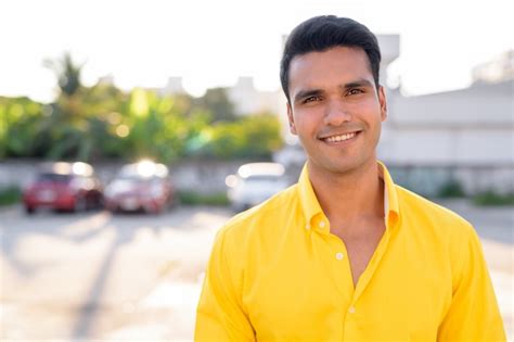 Premium Photo Happy Young Handsome Indian Man Smiling In The Streets