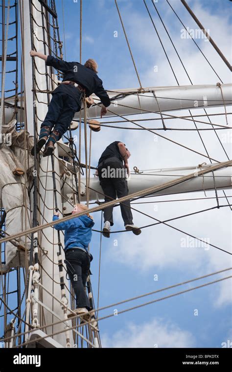 Sailors And Participants Working The Rigging And Sails At The 2010 Tall