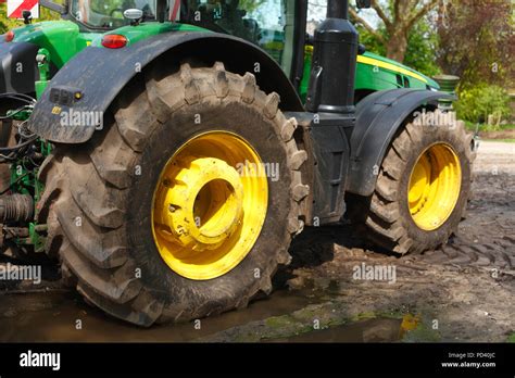 Tractor Black Tractor Tires Yellow Hubcaps Stock Photo Alamy