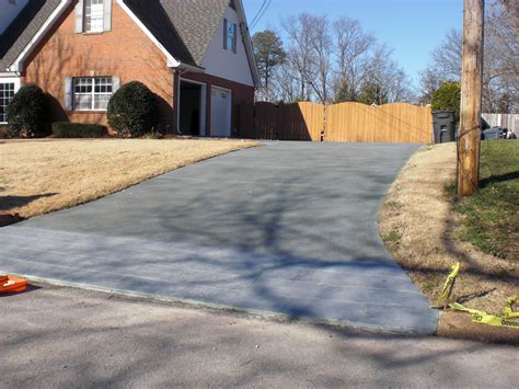 Driveway with solid stain in Storm w/ Semi-transparent highlights Water ...