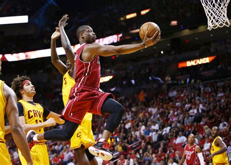 Lebron James Scores 25 Points Dwyane Wade Adds 24 To Help Heat Hold Off Cavaliers 114 107