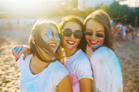 Premium Photo A Group Of Friends Have Fun Dance At Holi Festival